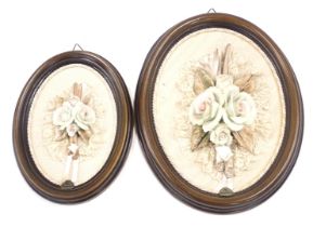 Two Via Veneto ceramic flower pictures, each of oval design with material back, on oak frame, 26cm a