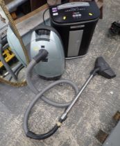 A Rexel shredder and a Miele vacuum cleaner. (2)