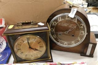 An Art Deco oak cased mantel clock and a further metamec mantel clock, with retirement presentation.