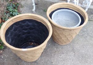 Two plastic terracotta style acorn planters and a granite finish planter. (3)