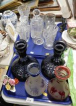 Decorative glassware, comprising two Bohemian style blue glass decanters, camel decorated decanters,