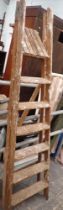 A wooden step ladder.