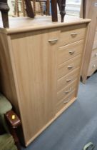 A beech finish storage cabinet.