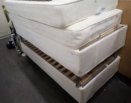 A pair of Ikea Alsarp Sultan single beds and mattresses.