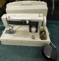 A cased Bentina sewing machine.