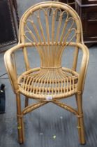 A wicker carver chair.