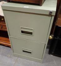 A metal green two drawer filing cabinet.