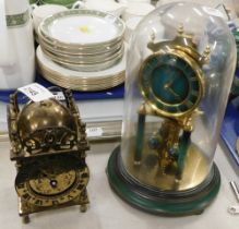 Two brass cased clocks, including one anniversary clock.