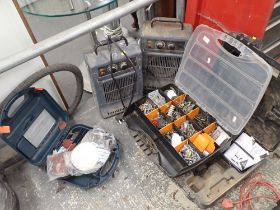 A group of empty tool chests, plus contents, and two heaters.