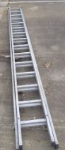 A metal two tier extending ladder.