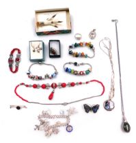 Silver and costume jewellery, including a grouse claw pin brooch, silver charm bracelet, silver and