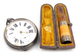 A Victorian meerschaum and amber cheroot holder, with silver mounts, cased, Birmingham 1900, and a C