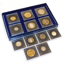 A set of Westminster Mint The Historic Coins of Great Britain coins, with gold and rhodium plating,