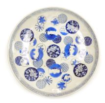 A 19thC Japanese porcelain charger, with blue and white decoration of circular overlapping symbols w