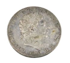 A George III silver crown 1820.