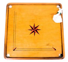 A wooden Carrom board game, with wooden coins, 81cm wide, 80cm deep.