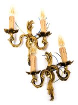 A pair of rococo style brass twin branch electric wall lights, 32.5cm high.