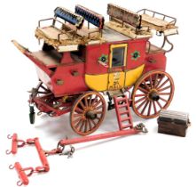 A scratch built model of a Royal Mail coach, with removable items including a step ladder and travel