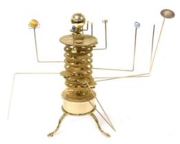A brass electrical powered orrery, with various planets, incomplete, mains powered, 38cm high.