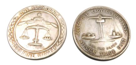 Two US Morgan Silver Trade Dollars.