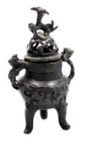 A Chinese metal koro, with dog of fo knop, domed lid and shaped arms, with a pierced and shaped body