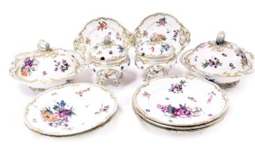 A 19thC continental porcelain part dinner service, each piece profusely decorated with handpainted f