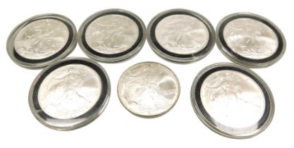 Six US Liberty silver dollars 2005, and another 2007. (7)