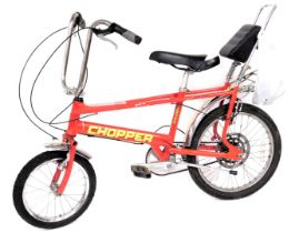 A Raleigh Chopper Mark 3 bicycle, with an Arrow Wedge 7005 series red aluminium frame.