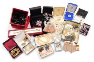 A group of costume jewellery, to include various decorative brooches, chains, faux pearl necklaces,