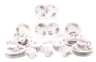 A Shelley porcelain Wild Flowers pattern tea service, comprising pair of bread plates, pair of cream