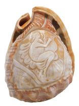 A Neapolitan conch shell cameo, carved with Cartha the goddess playing a harp, 12cm high.
