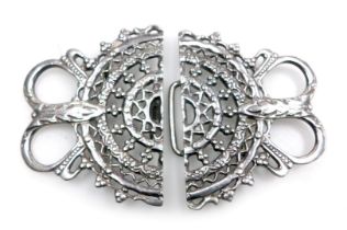 A George V silver nurse's buckle, with pierced and embossed decoration, Birmingham 1924, 2.01oz.