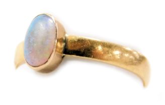 A 22ct gold and opal single stone ring, size P, 2.1g.