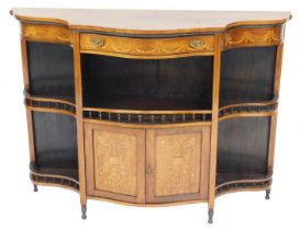 A late Victorian rosewood and inlaid serpentine cabinet, with a frieze drawer over a central galleri