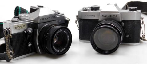 A Yashica TL-Elecro camera, in case, and a Praktica MTL5 camera, in case.