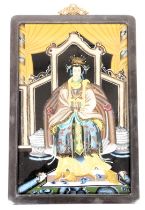 A 20thC Chinese ancestor portrait on glass, depicting a high ranking woman in a seated pose, with ha