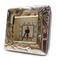 A silver mounted strut clock, circular enamel dial bearing Roman numerals, centre seconds, quartz mo