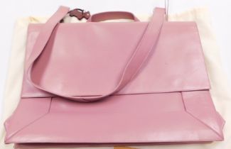 A Radley pink leather shoulder bag, with a lined and fitted interior, and outer dust cover, 41cm wid