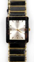 A Tungsten gentleman's dress wristwatch, rectangular silvered dial bearing Arabic numerals at quarte