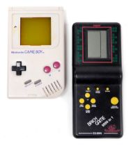 A Nintendo Game Boy G20269095, together with a Game Mate brick game ES9-999. (2)