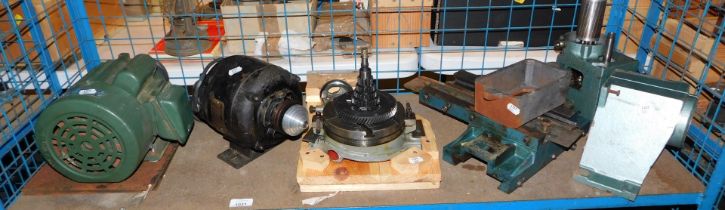 Two electric motors, a set of gearing, and various other engineering tools.