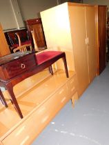 A Stag telephone table with single drawer, a dressing table, a two door wardrobe and a single door c