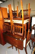 A drop leaf dining table and four dining chairs. This lot is located at our additional premises SALE