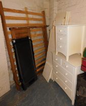 A quantity of bedroom furniture, including a bed base, a treadmill, a wardrobe flat packed, a small