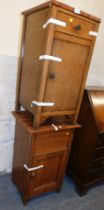 Two oak bedside cupboards.