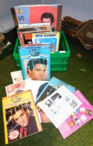 Elvis memorabilia including books and records. (a quantity)