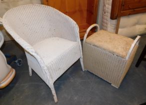 A Lloyd Loom style chair and a Lloyd Loom style ottoman.