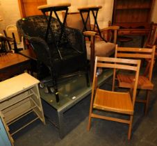 A smoked glass topped coffee table and two stools, together with a small number of golf clubs, two e