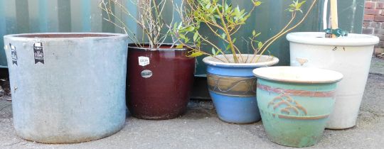 A group of plant pots, differing sizes, colours and designs, the largest 53cm diameter.