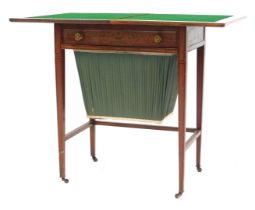 An Edwardian Sheraton Revival satinwood card and work table, with rosewood cross banding and painted